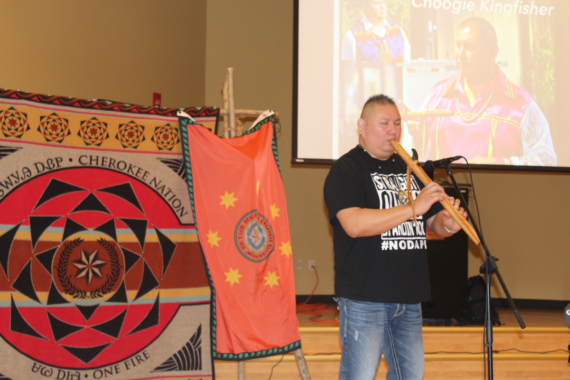 Choogie Kingfisher playing the flute